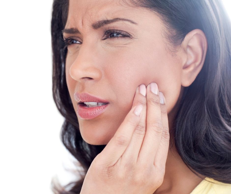 missing tooth - woman with tooth pain