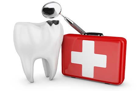 A damaged tooth and first-aid kit