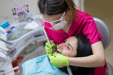 Woman receiving a dental cleaning